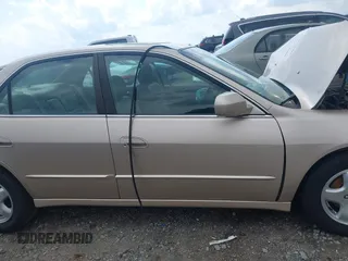 2000 Honda Accord EX z VIN 1HGCG1653YA030361, wystawiony jako IAAI lot #42268744 z przebiegiem 53 809 mil mil oraz . Historia ofert i sprzedaży dostępna na DreamBid. Obrazek 13.