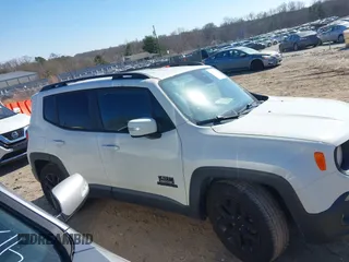 2018 Jeep Renegade Latitude with VIN ZACCJABB1JPH40117, listed as a IAAI auction lot 41676837 with 166,858 mi miles and . Bid and sale history available at DreamBid. Image 14.