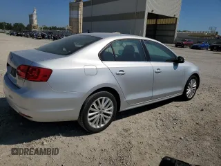 2011 Volkswagen Jetta SEL with VIN 3VWLZ7AJXBM056107, listed as a Copart auction lot 69955534 with 104,451 mi miles and Salvage title. Bid and sale history available at DreamBid. Image 3.
