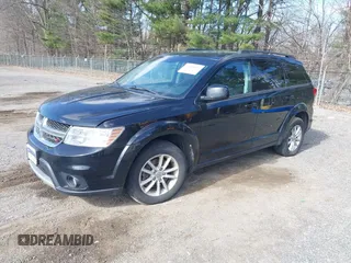 2015 Dodge Journey SXT with VIN 3C4PDDBG6FT561173, listed as a IAAI auction lot 41869022 with 185,106 mi miles and . Bid and sale history available at DreamBid. Image 2.