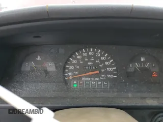 1992 Toyota Pickup DLX z VIN JT4RN93P1N5052818, wystawiony jako Copart lot #77344244 z przebiegiem 484 357 mil mil oraz Szkoda całkowita • Salvage title. Historia ofert i sprzedaży dostępna na DreamBid. Obrazek 9.