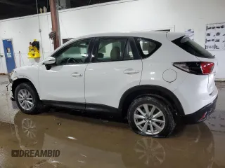 2015 Mazda CX-5 Sport with VIN JM3KE4BY4F0551679, listed as a Copart auction lot 68471374 with 198,987 mi miles and Non Repairable. Bid and sale history available at carsss.com. Image 2.