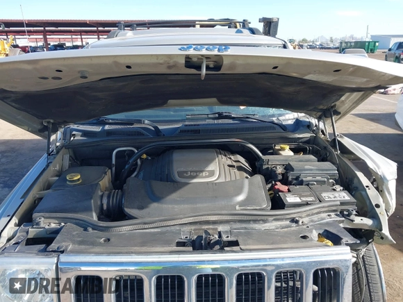 2006 Jeep Commander Limited z VIN 1J8HH58206C366040, wystawiony jako IAAI lot #40385858 z przebiegiem 313 805 mil mil oraz . Historia ofert i sprzedaży dostępna na DreamBid. Obrazek 10.