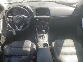 2015 Mazda CX-5 Grand Touring with VIN JM3KE4DY5F0540655, listed as a Copart auction lot 52893155 with 152,279 mi miles and Salvage Title. Bid and sale history available at carsss.com. Image 8.