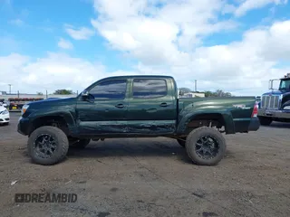 2012 Toyota Tacoma z VIN 3TMLU4EN6CM091483, wystawiony jako IAAI lot #41464391 z przebiegiem 124 204 mil mil oraz . Historia ofert i sprzedaży dostępna na DreamBid. Obrazek 14.