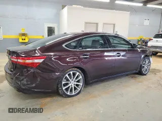 2014 Toyota Avalon Limited with VIN 4T1BK1EB7EU105830, listed as a Copart auction lot 88096505 with 106,626 mi miles and Salvage Title. Bid and sale history available at carsss.com. Image 3.