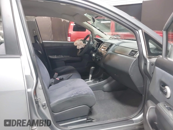2009 Nissan Versa 1.8 S with VIN 3N1BC11EX9L396439, listed as a IAAI auction lot 42049665 with 49,617 mi miles. Bid and sale history available at carsss.com. Image 5.