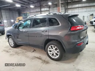 2015 Jeep Cherokee Latitude with VIN 1C4PJMCS0FW787988, listed as a Copart auction lot 52105155 with 117,254 mi miles and Salvage Title. Bid and sale history available at DreamBid. Image 2.