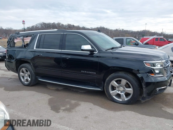 2019 Chevrolet Suburban Premier with VIN 1GNSKJKC7KR261826, listed as a IAAI auction lot 41652451 with 127,032 mi miles and . Bid and sale history available at DreamBid. Image 13.