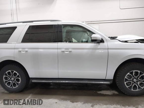 2023 Ford Expedition XLT with VIN 1FMJU1J83PEA51200, listed as a IAAI auction lot 42309932 with 43,965 mi miles and . Bid and sale history available at DreamBid. Image 13.