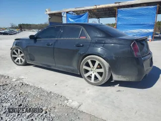 2012 Chrysler 300 SRT8 with VIN 2C3CCAFJ0CH801896, listed as a Copart auction lot 46991275 with 117,467 mi miles and Salvage Title. Bid and sale history available at carsss.com. Image 2.