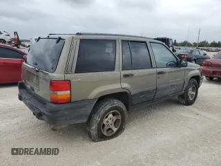 1998 Jeep Grand Cherokee Laredo with VIN 1J4GZ58S6WC137968, listed as a Copart auction lot 84083454 with 0 mi miles and Non Repairable. Bid and sale history available at carsss.com. Image 3.