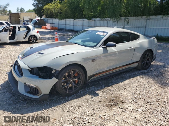 2021 Ford Mustang Mach 1 with VIN 1FA6P8R04M5551165, listed as a Copart auction lot 59977295 with 11,739 mi miles and Salvage title. Bid and sale history available at DreamBid. Image 1.