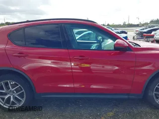 2018 Alfa Romeo Stelvio Sport z VIN ZASFAKPN0J7B61761, wystawiony jako IAAI lot #41144776 z przebiegiem 34 314 mil mil oraz . Historia ofert i sprzedaży dostępna na DreamBid. Obrazek 13.