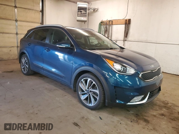 2017 Kia Niro Touring with VIN KNDCE3LC0H5063880, listed as a Copart auction lot 49809454 with 25,817 mi miles and Salvage Title. Bid and sale history available at carsss.com. Image 4.