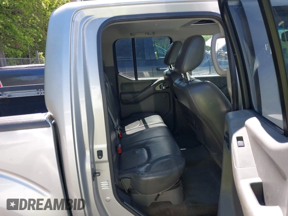 2011 Nissan Frontier Pro-4X with VIN 1N6AD0EV0BC408218, listed as a IAAI auction lot 42187823 with 165,995 mi miles and . Bid and sale history available at DreamBid. Image 8.