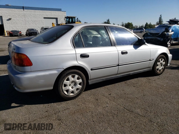 1999 Honda Civic LX with VIN 2HGEJ6571XH552867, listed as a Copart auction lot 81715654 with 234,544 mi miles and Salvage Title. Bid and sale history available at DreamBid. Image 3.