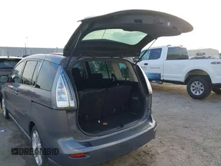 2009 Mazda 5 Sport with VIN JM1CR29L990341261, listed as a IAAI auction lot 41522567 with 123,465 mi miles and . Bid and sale history available at DreamBid. Image 17.