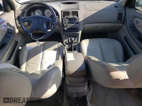 2000 Nissan Maxima GXE z VIN JN1CA31D2YT523871, wystawiony jako Copart lot #65902984 z przebiegiem 235 064 mil mil oraz Szkoda całkowita • Salvage title. Historia ofert i sprzedaży dostępna na DreamBid. Obrazek 8.
