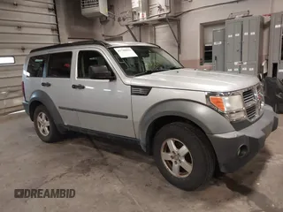 2007 Dodge Nitro SXT with VIN 1D8GU28K47W569317, listed as a IAAI auction lot 41740052 with 220,265 mi miles. Bid and sale history available at carsss.com. Image 1.
