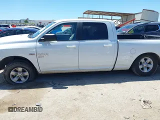 2021 Ram 1500 SLT with VIN 1C6RR6TTXMS517345, listed as a IAAI auction lot 42314123 with 107,307 mi miles and . Bid and sale history available at DreamBid. Image 14.