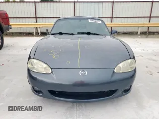 2001 Mazda MX-5 Miata with VIN JM1NB353210210976, listed as a Copart auction lot 59653695 with 152,250 mi miles and Salvage title. Bid and sale history available at DreamBid. Image 5.