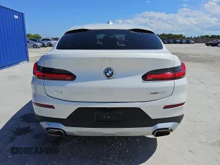 2024 BMW X4 xDrive30i z VIN 5UX33DT09R9W70709, wystawiony jako Copart lot #56997035 z przebiegiem 21 308 mil mil oraz Tytuł czysty. Historia ofert i sprzedaży dostępna na DreamBid. Obrazek 6.