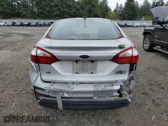2015 Ford Fiesta SE с VIN 3FADP4BJ0FM199573, выставлен на аукционе Copart как лот 67113154 с пробегом Не указан миль и Списание • Salvage title. История ставок и продаж доступна на DreamBid. Изображение 6.