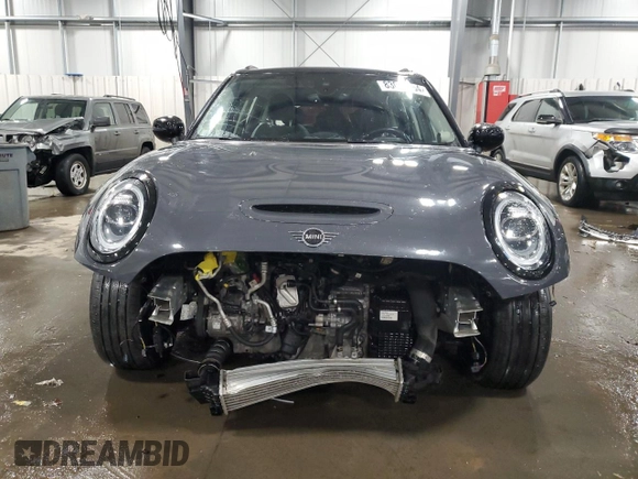 2021 MINI Clubman Cooper S with VIN WMWXJ1C05M2P49901, listed as a Copart auction lot 83023554 with 49,357 mi miles and Salvage Title. Bid and sale history available at carsss.com. Image 5.