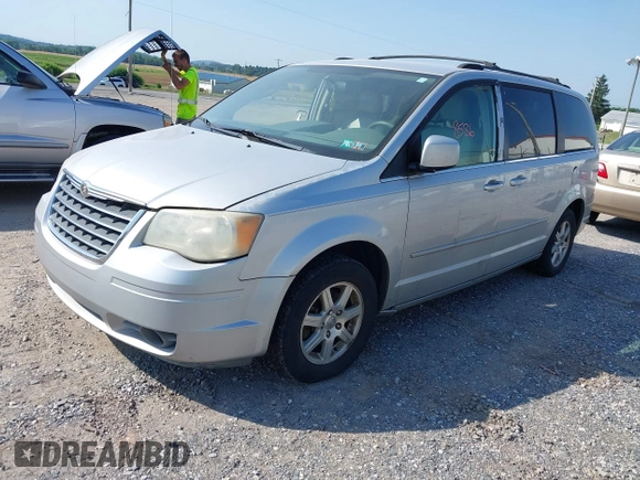 2008 Chrysler Town & Country Touring with VIN 2A8HR54P68R103852, listed as a IAAI auction lot 42588586 with 165,022 mi miles and . Bid and sale history available at DreamBid. Image 2.