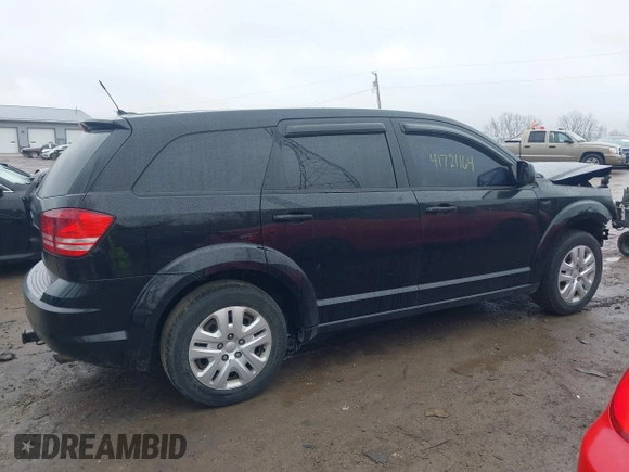 2014 Dodge Journey SE with VIN 3C4PDCAB8ET151666, listed as a IAAI auction lot 41721164 with 262,991 mi miles and . Bid and sale history available at carsss.com. Image 13.