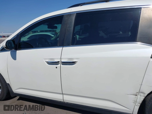 2016 Honda Odyssey EX-L with VIN 5FNRL5H67GB128929, listed as a IAAI auction lot 42126878 with 157,836 mi miles. Bid and sale history available at carsss.com. Image 14.