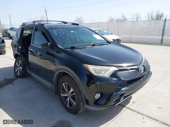 2016 Toyota RAV4 XLE with VIN 2T3WFREV9GW292772, listed as a IAAI auction lot 41727898 with 117,922 mi miles. Bid and sale history available at carsss.com. Image 1.