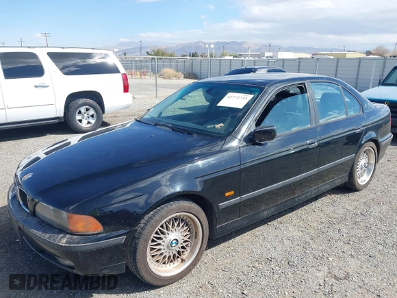 2000 BMW 5 Series 528iA with VIN WBADM6344YGU10257, listed as a IAAI auction lot 41773733 with 231,028 mi miles. Bid and sale history available at carsss.com. Image 2.