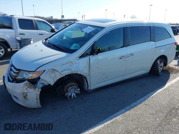 2014 Honda Odyssey EX-L with VIN 5FNRL5H65EB012528, listed as a IAAI auction lot 41951424 with 161,832 mi miles and . Bid and sale history available at DreamBid. Image 2.