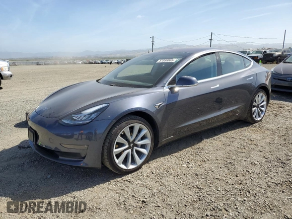 2018 Tesla Model 3 Long Range Battery z VIN 5YJ3E1EB0JF113044, wystawiony jako Copart lot #57056865 z przebiegiem 65 613 mil mil oraz Szkody całkowita. Historia ofert i sprzedaży dostępna na DreamBid. Obrazek 1.