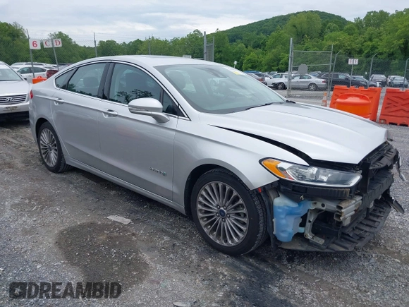 2013 Ford Fusion Titanium Hybrid with VIN 3FA6P0RU3DR281914, listed as a IAAI auction lot 42380838 with 166,956 mi miles and . Bid and sale history available at DreamBid. Image 1.