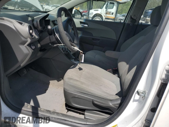 2013 Chevrolet Sonic LT with VIN 1G1JC5SH4D4164838, listed as a Copart auction lot 53611635 with 134,098 mi miles and Salvage Title. Bid and sale history available at DreamBid. Image 7.