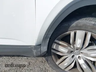 2019 Volkswagen Atlas SE z VIN 1V2WR2CA8KC504134, wystawiony jako IAAI lot #41700050 z przebiegiem 97 047 mil mil oraz . Historia ofert i sprzedaży dostępna na DreamBid. Obrazek 17.