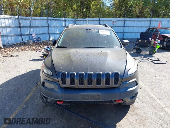 2014 Jeep Cherokee Trailhawk with VIN 1C4PJMBB0EW237741, listed as a IAAI auction lot 40505251 with 139,883 mi miles and . Bid and sale history available at DreamBid. Image 12.