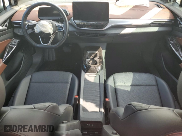 2021 Volkswagen ID.4 Pro S z VIN WVGKMPE22MP046499, wystawiony jako Copart lot #57947235 z przebiegiem 26 759 mil mil oraz Nie do naprawy • Non repairable. Historia ofert i sprzedaży dostępna na DreamBid. Obrazek 8.