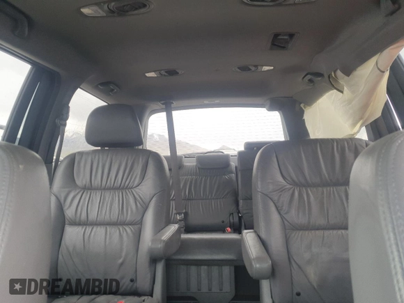 2009 Honda Odyssey EX-L z VIN 5FNRL38669B034578, wystawiony jako Copart lot #53000065 z przebiegiem 177 850 mil mil oraz Szkoda całkowita • Salvage title. Historia ofert i sprzedaży dostępna na DreamBid. Obrazek 10.