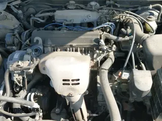 1999 Toyota Camry LE with VIN JT2BG22K4X0271967, listed as a IAAI auction lot 42464880 with 200,314 mi miles and . Bid and sale history available at DreamBid. Image 12.