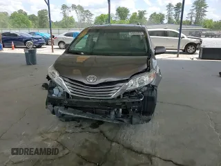2015 Toyota Sienna XLE с VIN 5TDYK3DC0FS630013, выставлен на аукционе Copart как лот 60044955 с пробегом 124 063 миль миль и Списание • Salvage title. История ставок и продаж доступна на DreamBid. Изображение 14.
