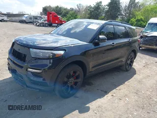 2023 Ford Explorer ST z VIN 1FM5K8GC7PGA12321, wystawiony jako IAAI lot #42125721 z przebiegiem 27 856 mil mil oraz . Historia ofert i sprzedaży dostępna na DreamBid. Obrazek 2.