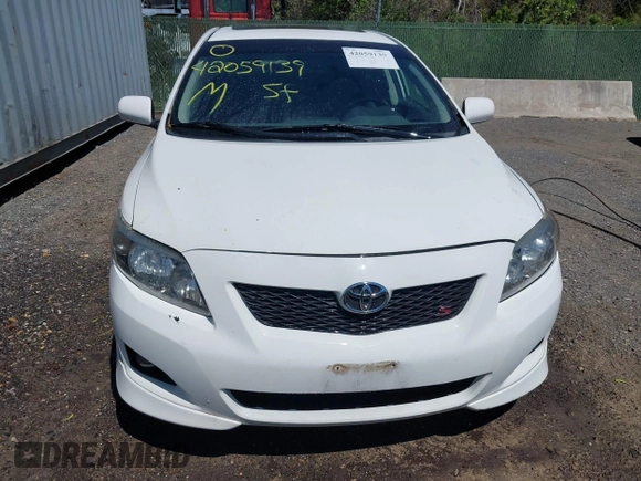 2009 Toyota Corolla with VIN 2T1BU40E49C157663, listed as a IAAI auction lot 42059139 with 135,685 mi miles. Bid and sale history available at carsss.com. Image 12.