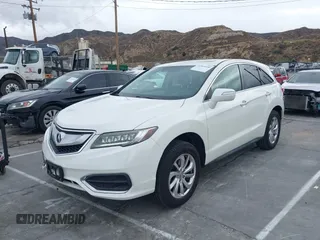 2018 Acura RDX with VIN 5J8TB3H31JL012439, listed as a IAAI auction lot 41565530 with 63,909 mi miles and . Bid and sale history available at DreamBid. Image 2.