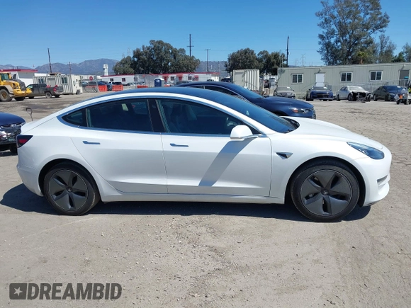 2019 Tesla Model 3 Mid Range with VIN 5YJ3E1EA1KF422983, listed as a IAAI auction lot 41861334 with 53,017 mi miles. Bid and sale history available at carsss.com. Image 13.