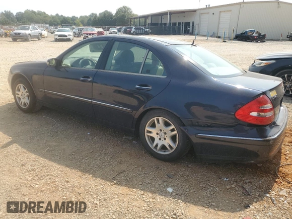 2003 Mercedes-Benz E-Class 3.2L with VIN WDBUF65JX3A313638, listed as a Copart auction lot 70869194 with 142,524 mi miles and Salvage Title. Bid and sale history available at carsss.com. Image 2.