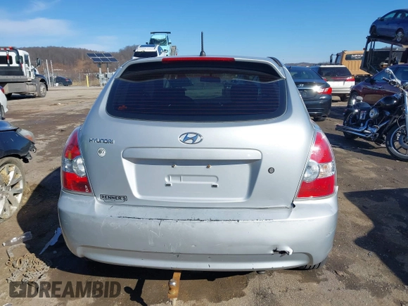 2007 Hyundai Accent GS with VIN KMHCM36C97U043769, listed as a IAAI auction lot 41526011 with 230,566 mi miles. Bid and sale history available at carsss.com. Image 6.